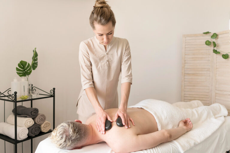 The Lasting Benefits of Stone Massage: Merging Heat Therapy and Muscle Recovery
